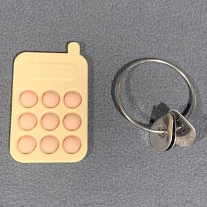 Mushie Silicone Phone Press Toy & Lovevery Metal Key Ring Sensory Toy Bundle
